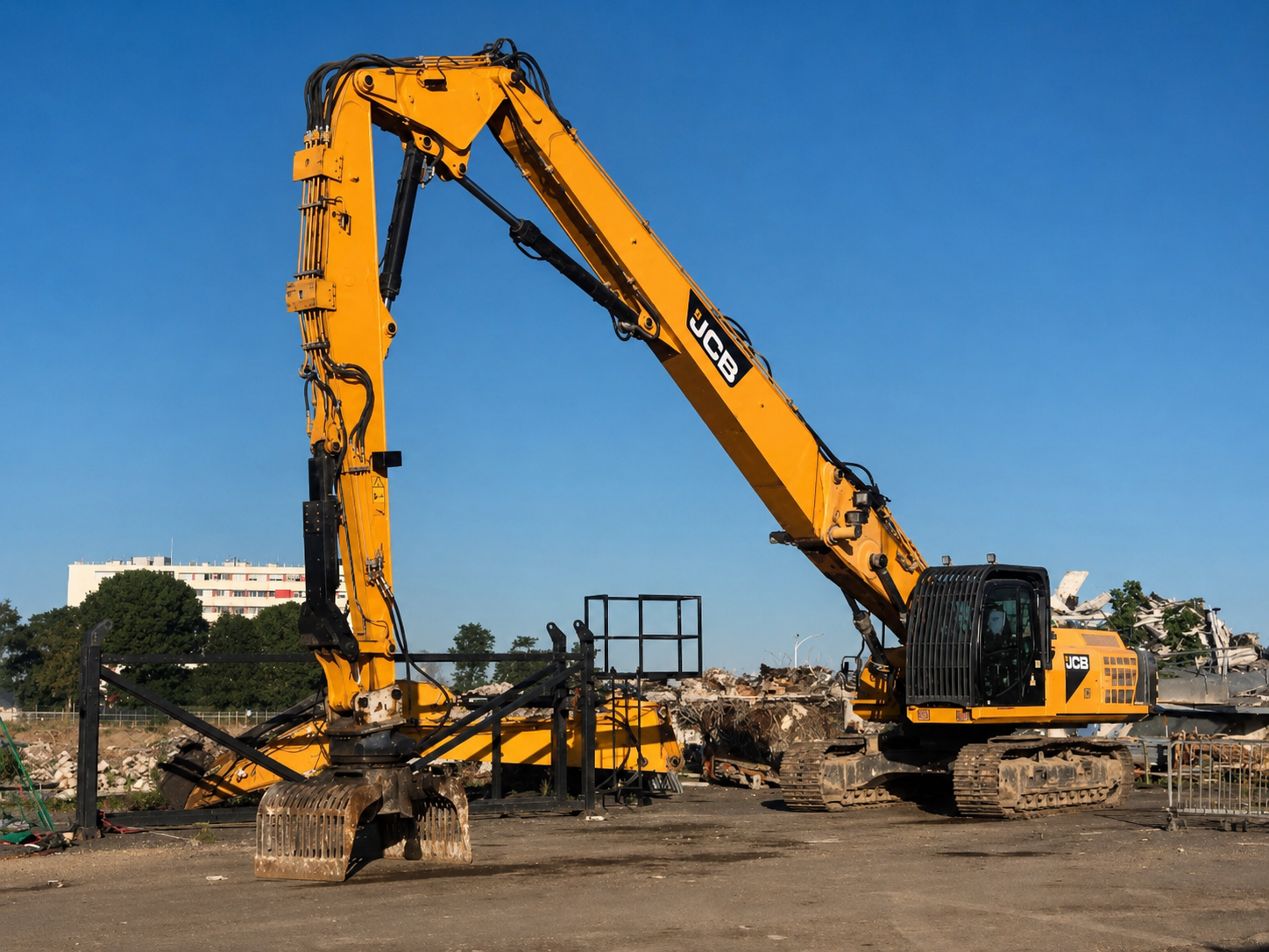 Representative high-reach excavator on a major industrial demolition site